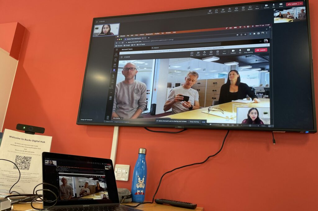 two screens with team's video call