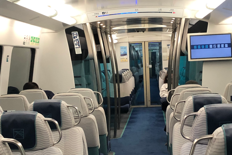 Inside a train from the airport. Progressive lights are used to show location between train stations.